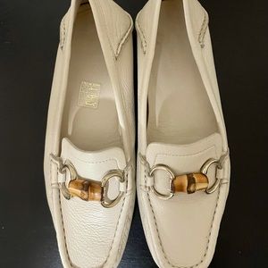 White leather Gucci loafers